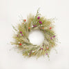 The ammobium amaranth wreath. Made with: lipidium field pennycress, green wheat, flax, ammobium, purple globe amaranth, and coral globe amaranth. (zoomed out view)