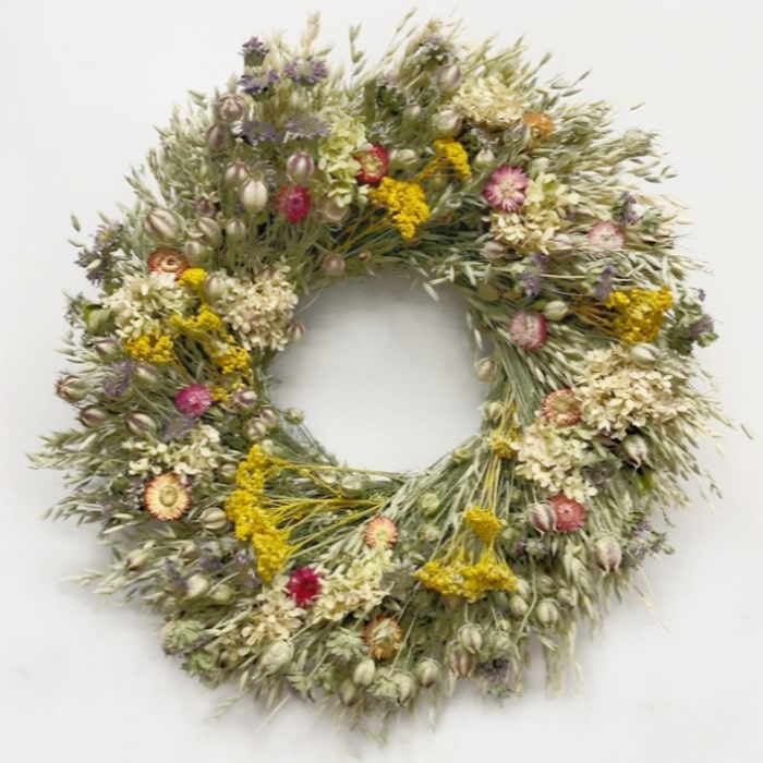 The Limelight Nigella Wreath. Made with: nigella, avena oats, lemon mint, yarrow, strawflowers, and limelight hydrangea. (zoomed in view)