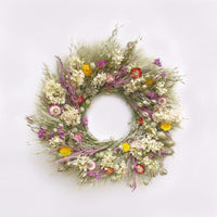 The Limelight Statice Wreath. Handmade with: green wheat, avena oats, nigella, sinuata statice, rattail statice, limelight hydrangea, and strawflowers! (A zoomed out image)
