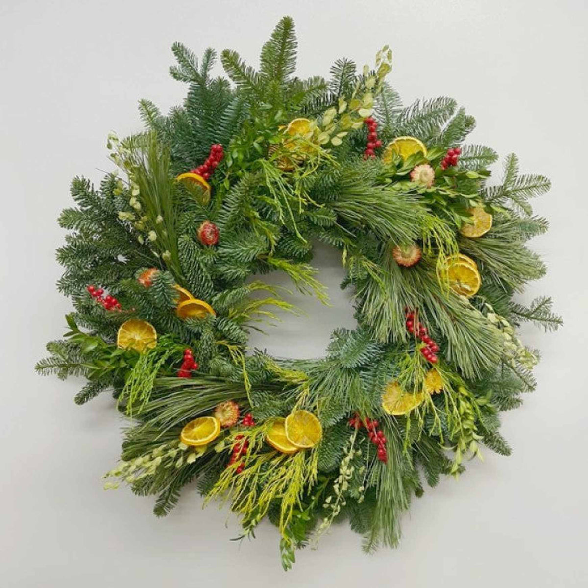 Almanac Planting Co Noble Orange Fresh Winter Wreath (Zoomed In)