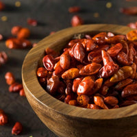 Almanac Planting Co Pequin Chili Pepper Plants. Dried fruit in a bowl. 