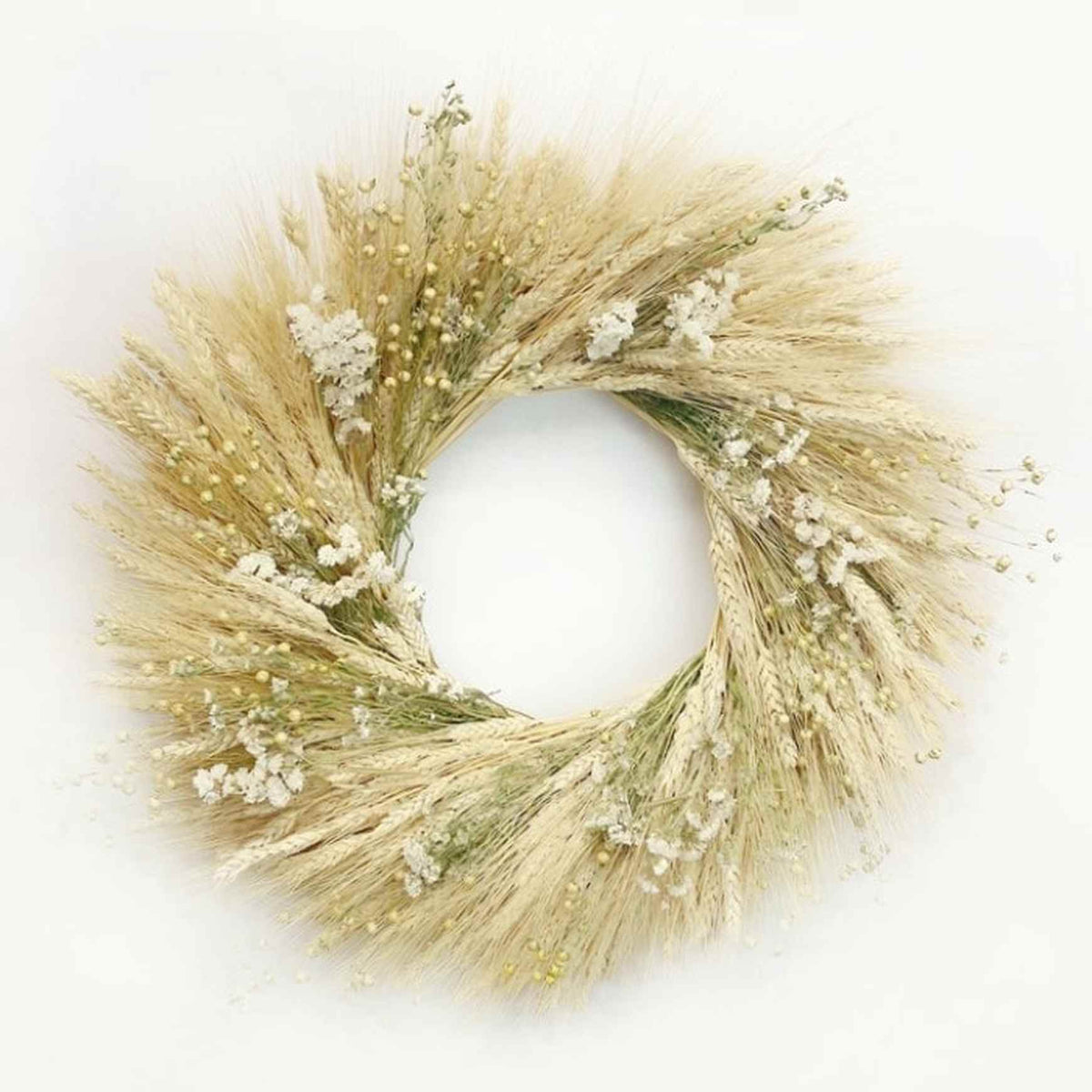 A fresh, hand made wreath of blonde wheat, flax, sinuata statice, and pearly everlasting.