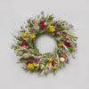 The Twiggy Amaranth Wreath. Made with: quail brush twigs, boxwood, nigella, blonde wheat, purple globe amaranth, yarrow, cockscomb celosia, poppy pods, and strawflowers. (zoomed out view)