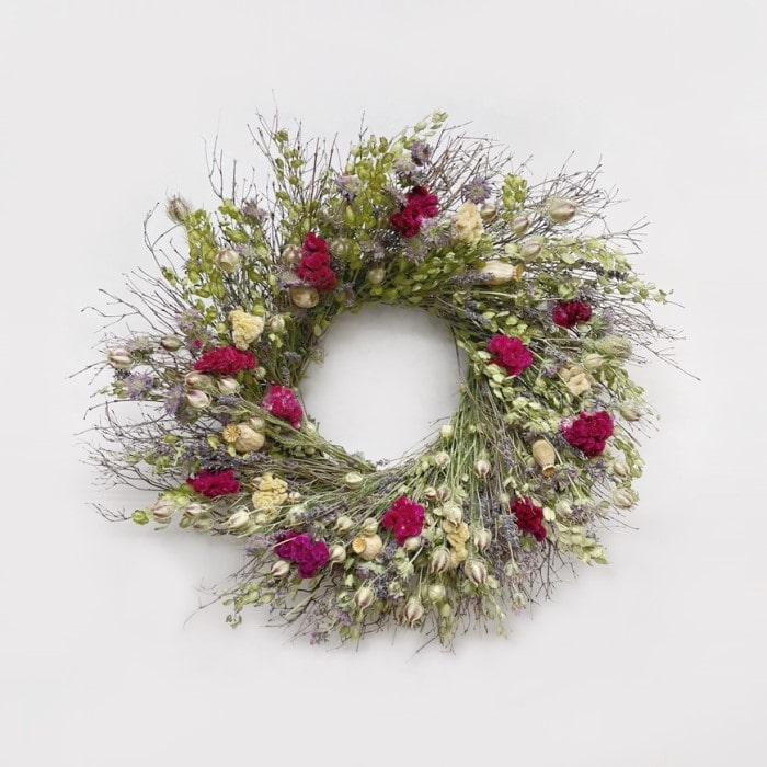 Twiggy Celosia Wreath. Handmade with: quail brush twigs, lupidium field pennycress, nigella lavender, lemon mint, buff cockscomb celosia, burgundy cockscomb celosia, and poppy pods. (A zoomed out image)
